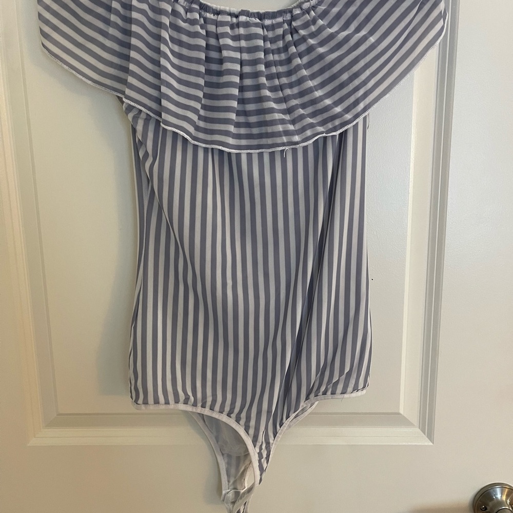 Bebe blue and white body suit